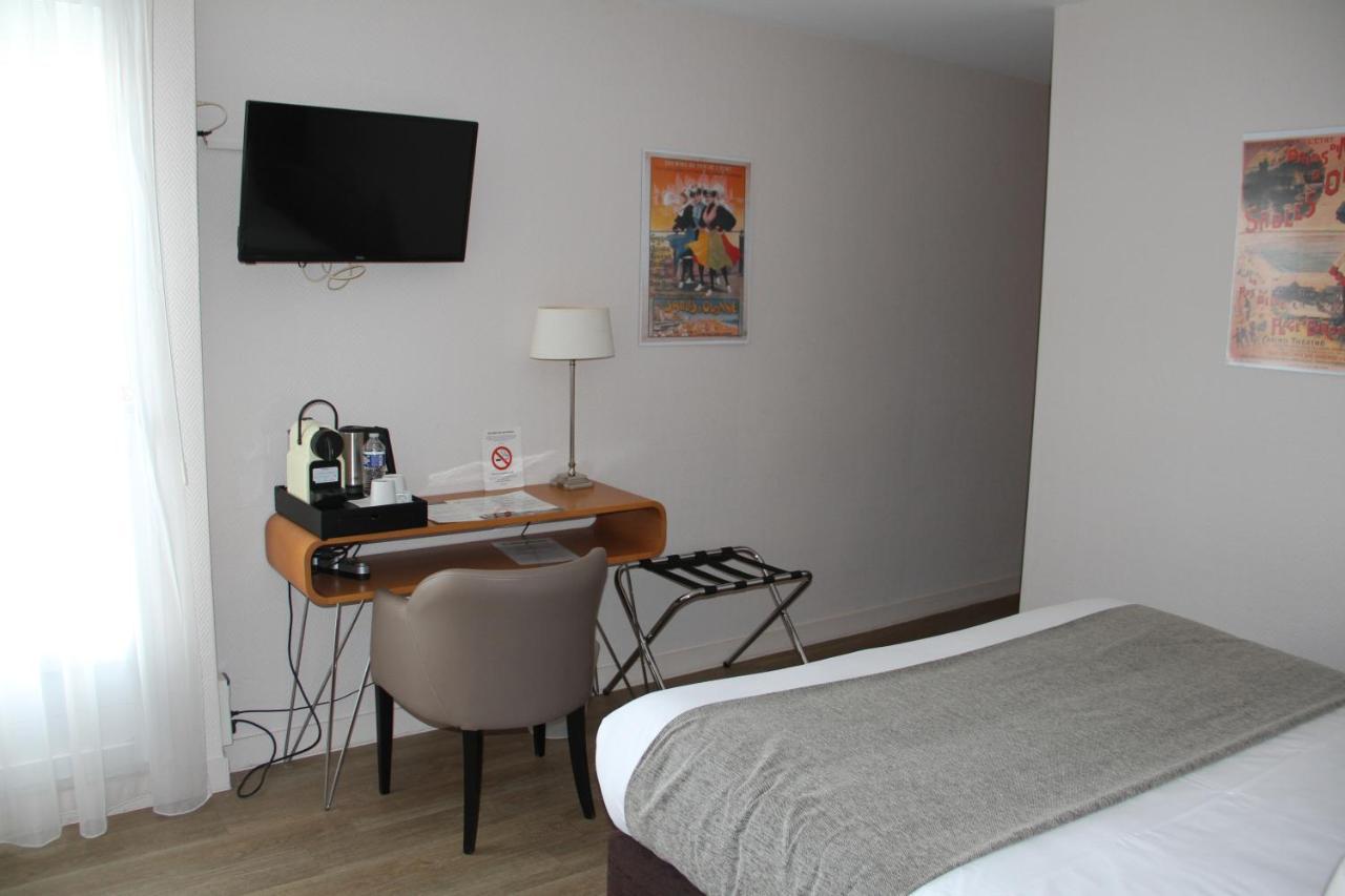 Cit'Hotel Le Chene Vert เลส์ซาบล์-โดล็อนน์ ภายนอก รูปภาพ