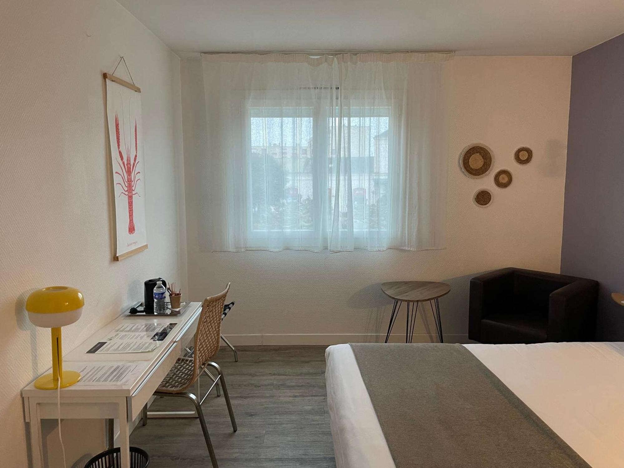 Cit'Hotel Le Chene Vert เลส์ซาบล์-โดล็อนน์ ภายนอก รูปภาพ